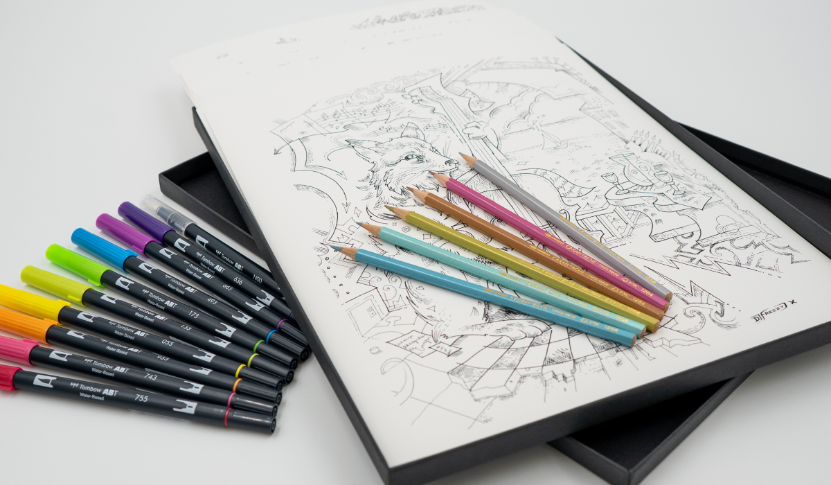 colored pencils over drawing book
